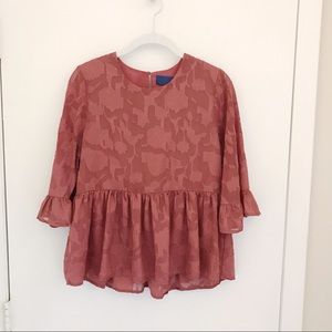 Francesca’s peplum swing top